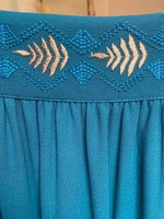 Long fluid skirt with vegetal embroidery