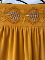 Long fluid skirt with vegetal embroidery