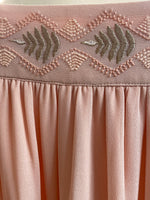 Long fluid skirt with vegetal embroidery