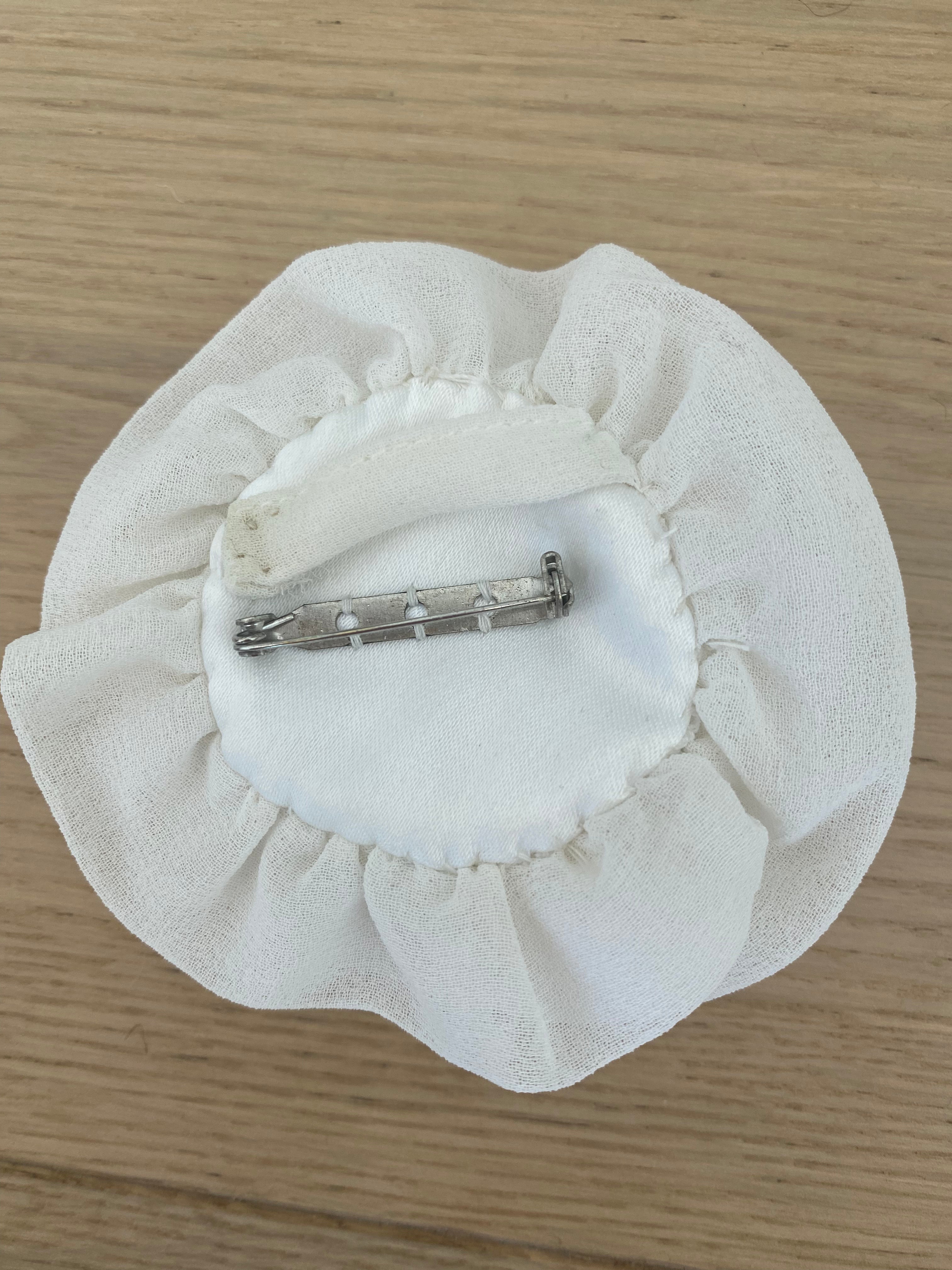 Muslin flower brooch