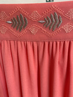 Long fluid skirt with vegetal embroidery